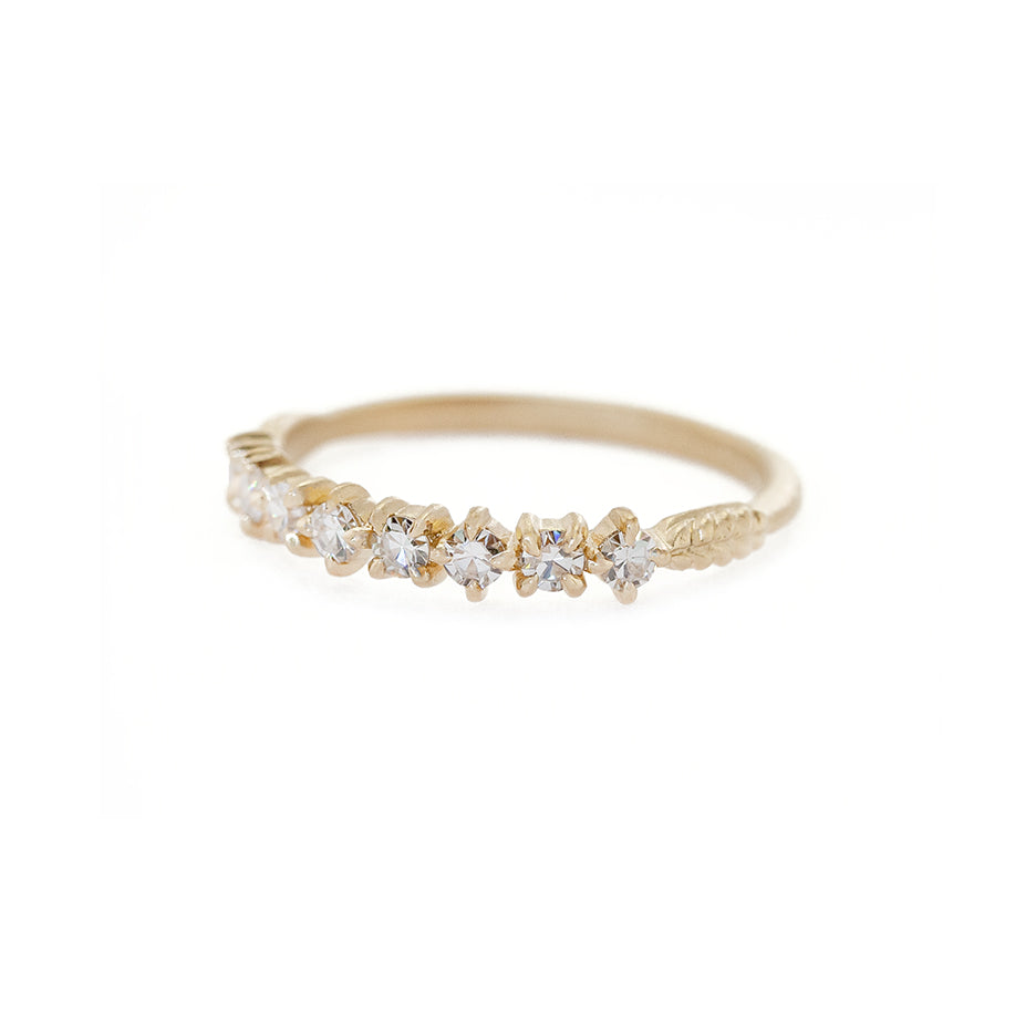 Handmade wedding or stacking band with single cut diamonds and Evergreen botanical details in 18K yellow gold by Designer Megan Thorne