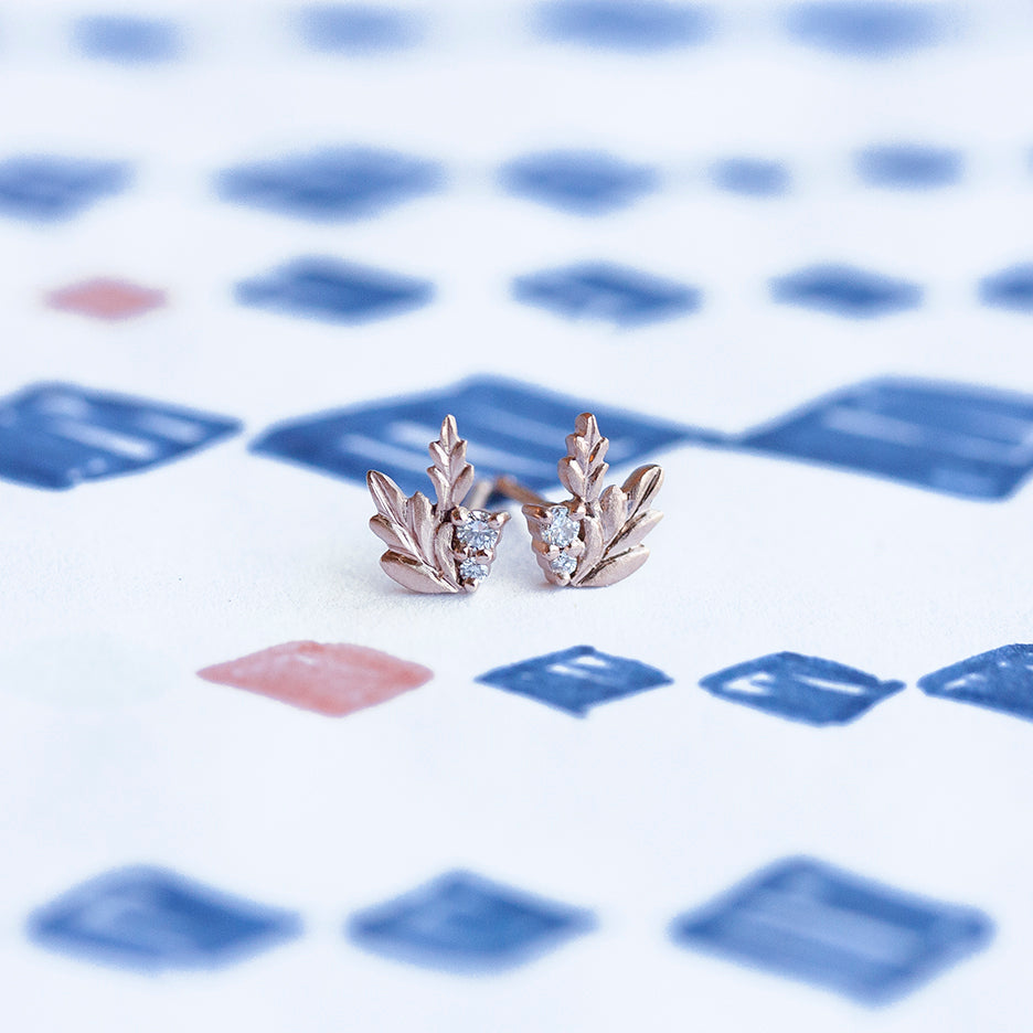 Handmade everyday stud earrings with diamonds and floral Wood Nymph details in 18K rose gold by Designer Megan Thorne