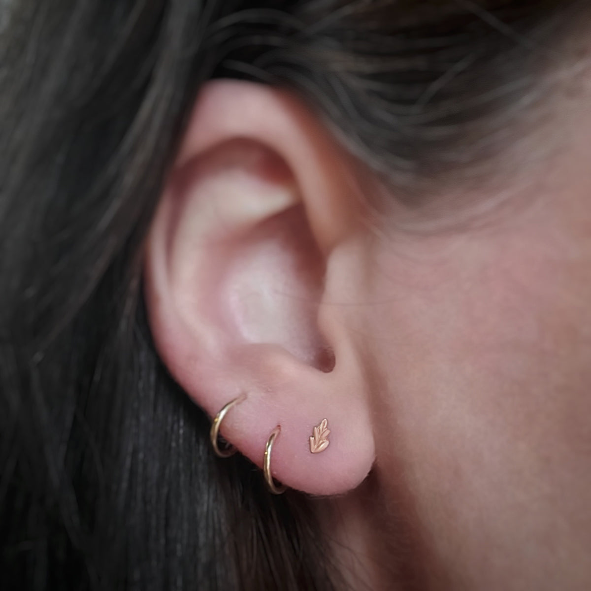 Handmade everyday stud earrings with hand carved botanical Wood Nymph details in 18K rose gold by Designer Megan Thorne
