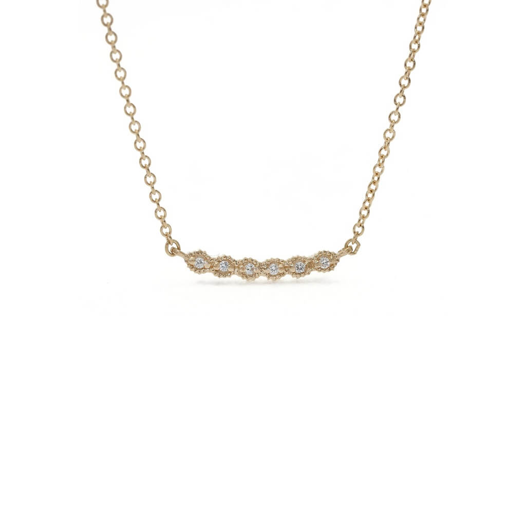 Handmade diamond necklace with vintage inspired ribbing in 18K yellow gold by Designer Megan Thorne