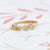 Handmade wide wedding band or stacking ring with diamonds and hand carved floral Wood Nymph details in 18K yellow gold by Designer Megan Thorne